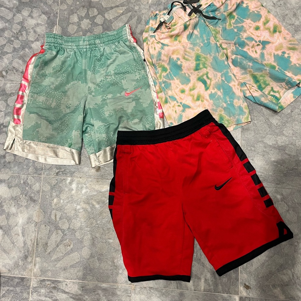 Nike Kids Red, Green, and Multicolor Shorts Trio bundle size Large
